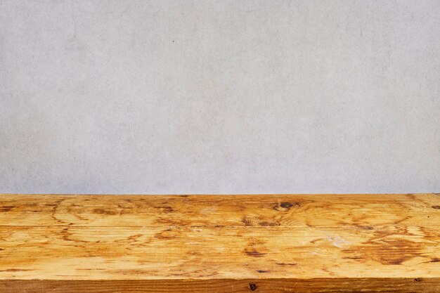 Empty wood plank table top with grunge background Mock up for display or montage of productBanner