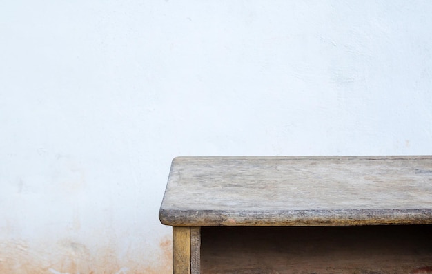 Empty wood table top on old concrete background