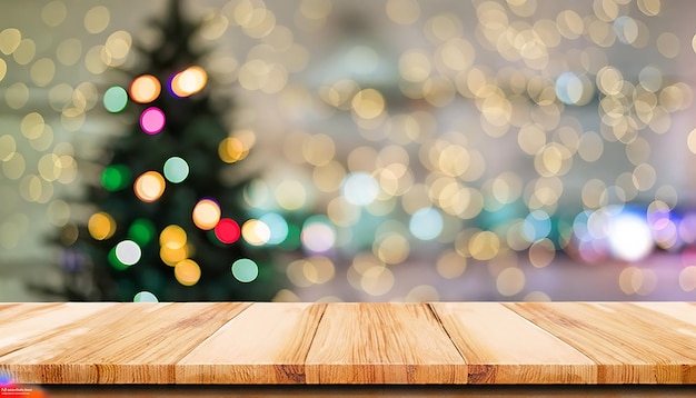 Empty wood table top with blur Christmas tree with bokeh light background for mockup