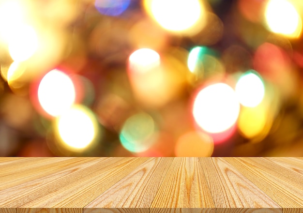 Empty wooden and bokeh lights