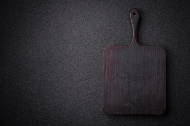 Empty wooden cutting board for preparing ingredients for preparing a delicious dish