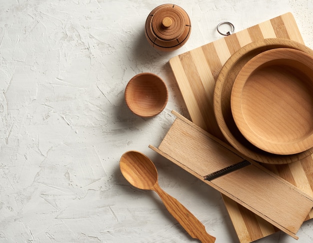 Empty wooden round plates and new cutting board