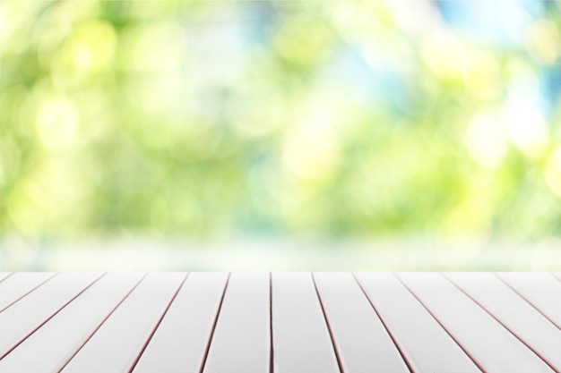 Empty wooden surface on blurred background