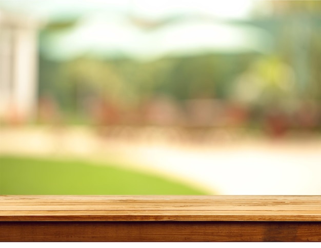 Empty wooden surface on blurred background