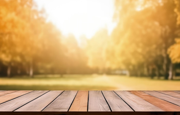 Empty wooden table and blurred background of park autumn with bokeh effect sunshine