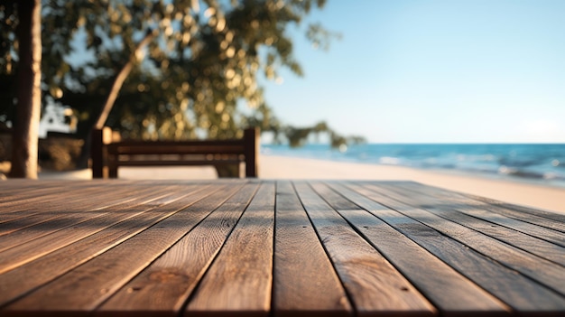 Empty wooden table on blurred background of sandy beach and blue ocean