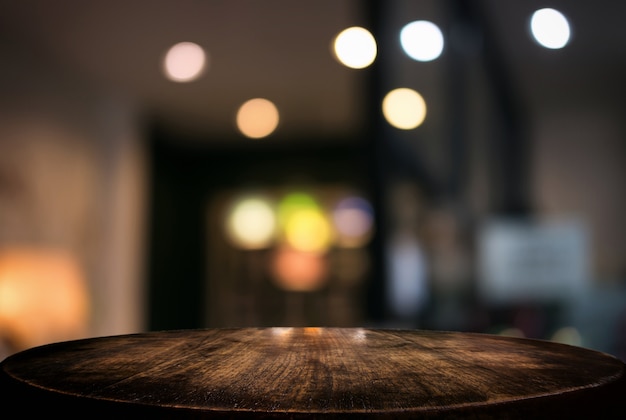 Empty wooden table and blurred background