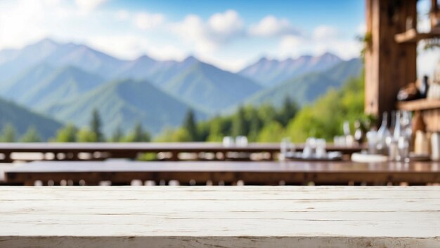 Photo the empty wooden table top with blur background of restaurant in the mountains for product display