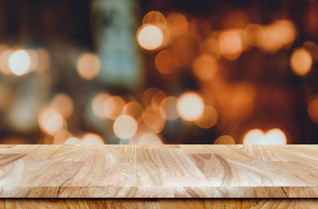 Empty wooden table with bokeh lights product display background