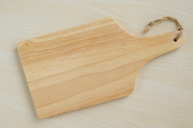 Empty wooden tray on table, food background