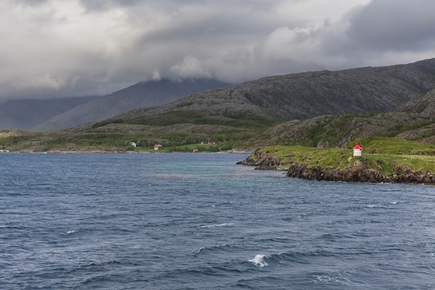 End of fjord. Beautiful Norwegian landscape. view of the fjords. Norway ideal fjord reflection in clear water In cloudy weather