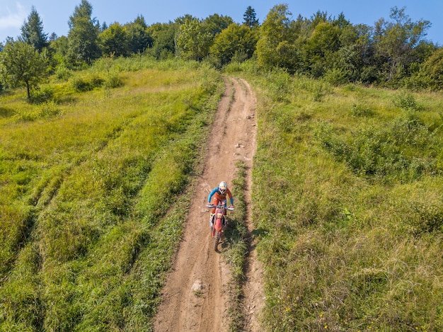 Enduro Athlete on a Summer Dirt Track Aerial View