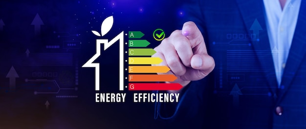 Photo energy efficiency concept businessman touching virtual screen of energy efficiency rating for energy efficient house building rate label audit renewable energy concept