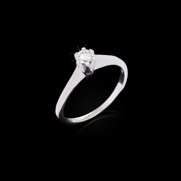 Engagement diamond ring on black background