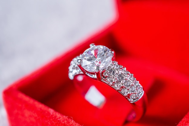 Engagement diamond ring in red jewelry gift box