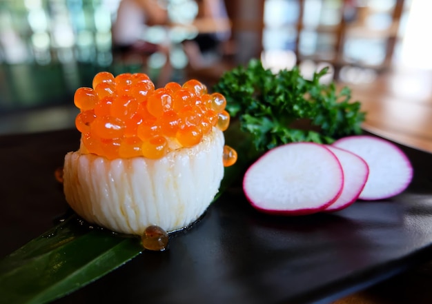 Engawa Sushi Roll topped with Salmon roe Japanese food