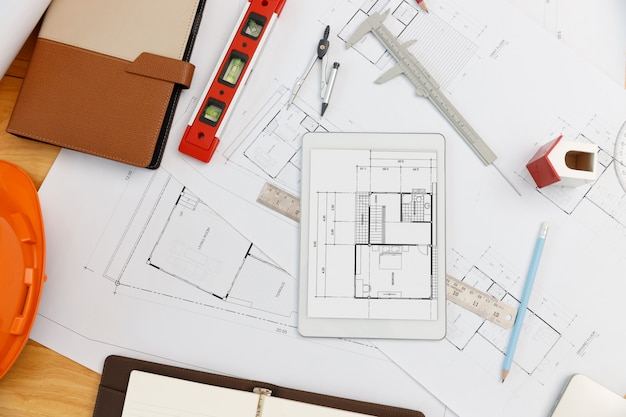 Engineer and Architect concept, Top view of Interior designer desk with blueprint