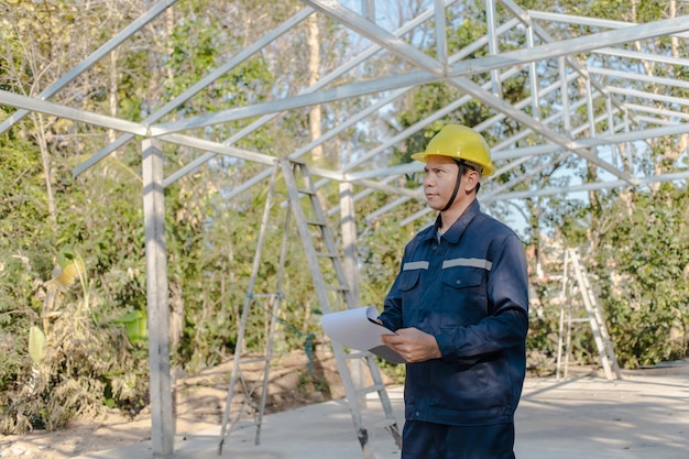 Engineer checking work at construction building