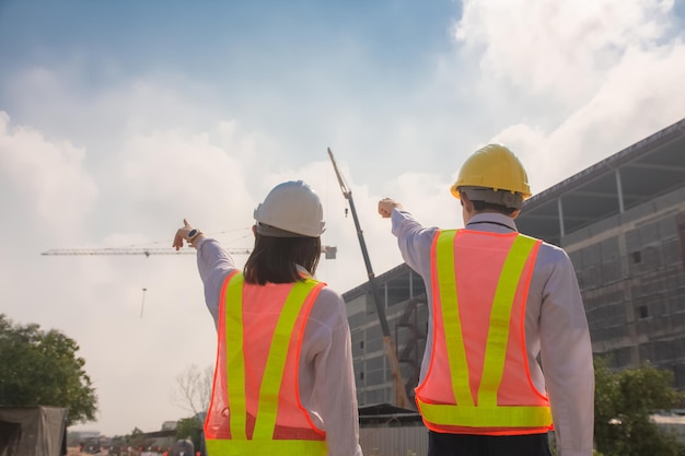 Engineer Construction concept, Asian engineer construction teamwork standing  on site construction