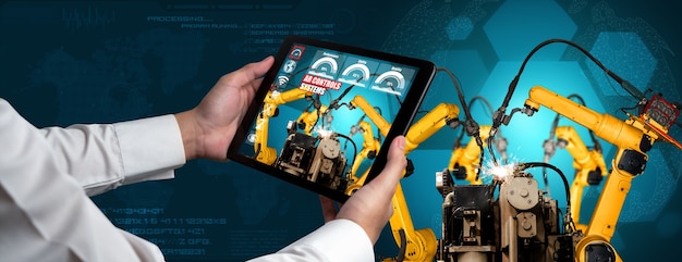 Engineer controls robotic arms by augmented reality industry technology