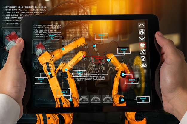 Engineer controls robotic arms by augmented reality industry technology