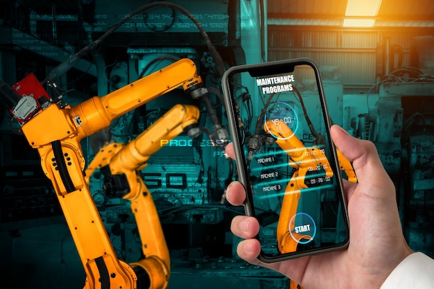 Engineer controls robotic arms by augmented reality industry technology