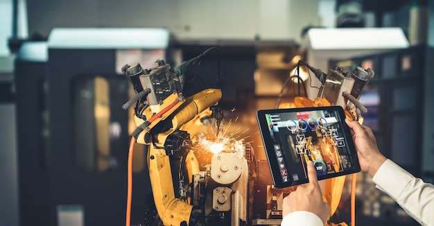 Engineer controls robotic arms by augmented reality industry technology