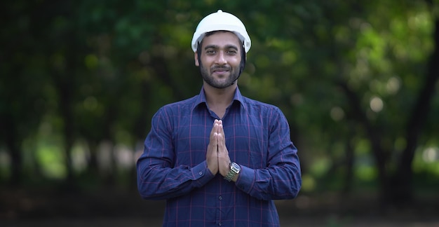 Engineer standing with folded hands