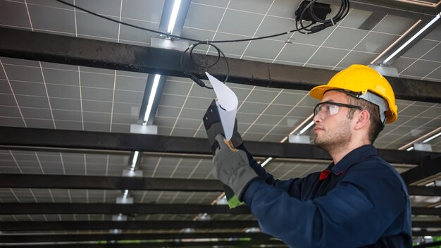 Photo engineer technical service checking installation solar cell panel