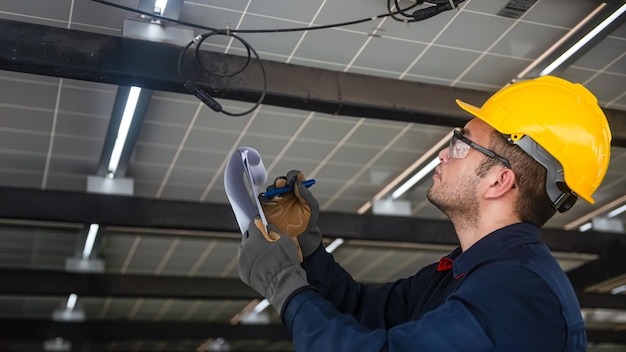 Photo engineer technical service checking installation solar cell panel