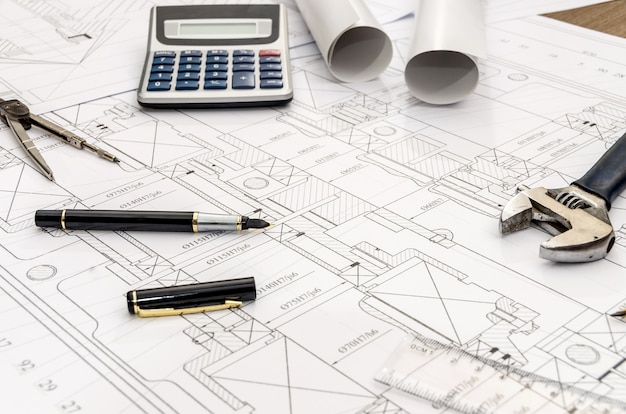 Engineer tools on sketch paper surface top view