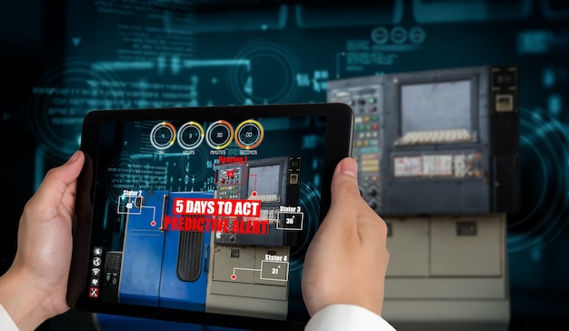 Engineer use augmented reality software in smart factory production line