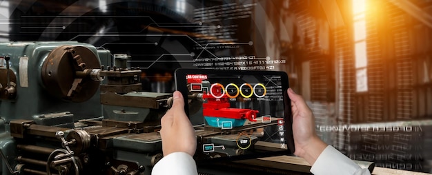 Engineer use augmented reality software in smart factory production line