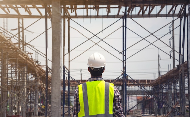 Engineer working on building site