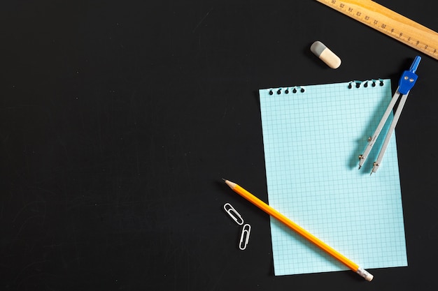 Engineering compass with blank paper background