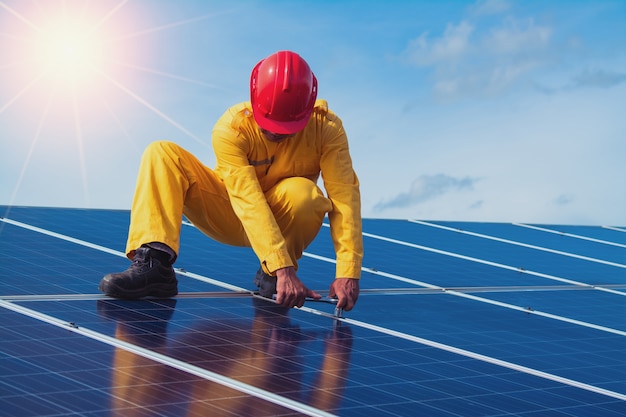 Engineers checking solar panels setup