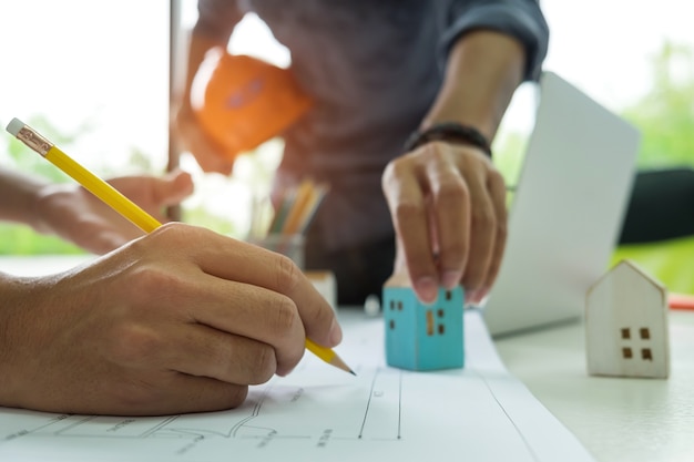 Engineers and designers are helping to design the house.