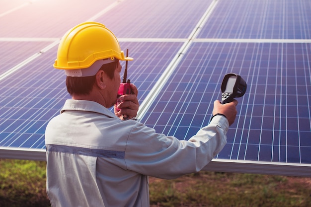 Engineers monitoring solar power