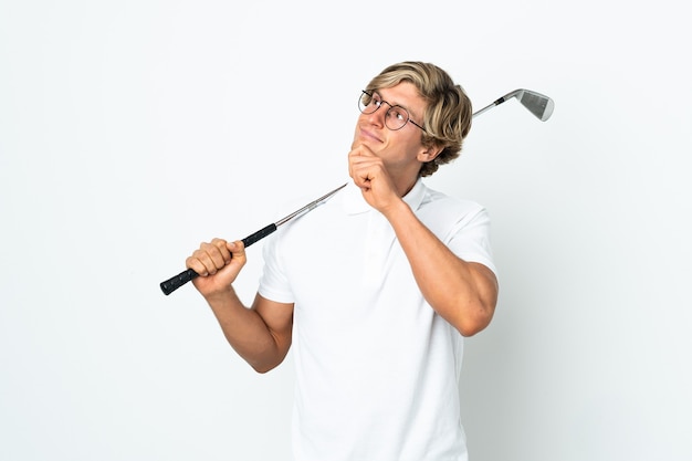 English man playing golf and looking up