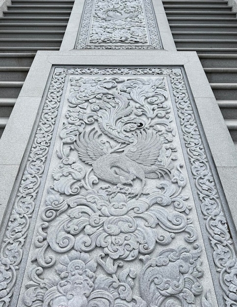 Engraving with Chinese theme pattern on Ngong Ping Tian Tian Buddha grand staircase