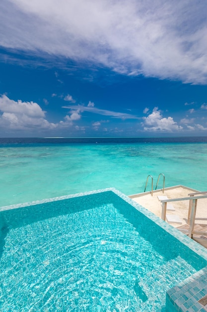 Enjoy the ocean view infinity pool on vacation Dream scene endless pool into perfect tropical blue