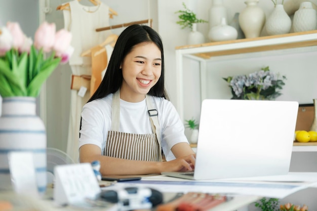 Enjoy young businesswoman celebrate success or happy pose