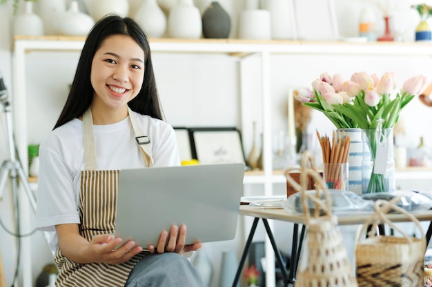 Enjoy young businesswoman celebrate success or happy pose