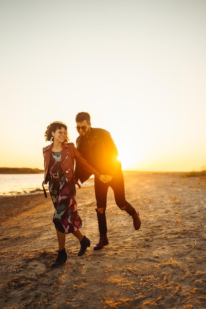 Enjoying time together Stylish and loving couple enjoying each other by the sea