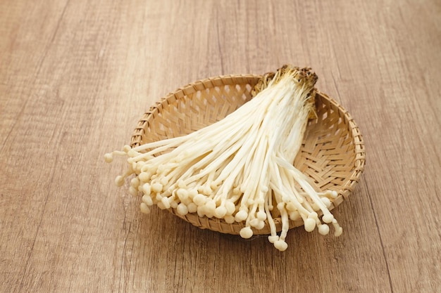 Enoki mushrooms (jamur enoki), an edible mushroom with a long white fruiting body like bean sprouts