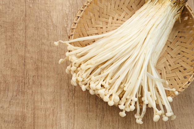 Enoki mushrooms (jamur enoki), an edible mushroom with a long white fruiting body like bean sprouts