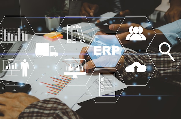 Enterprise Resource Planning (ERP) Software system for business resource plans. business people and financial and digital technology concept  icons on virtual screen.