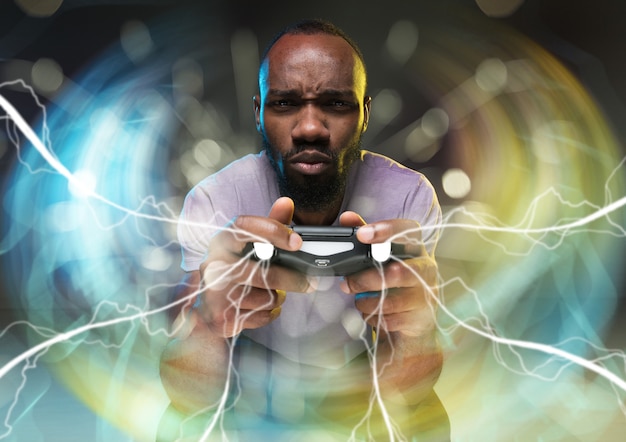 Enthusiastic gamer. Joyful young man holding a video game controller