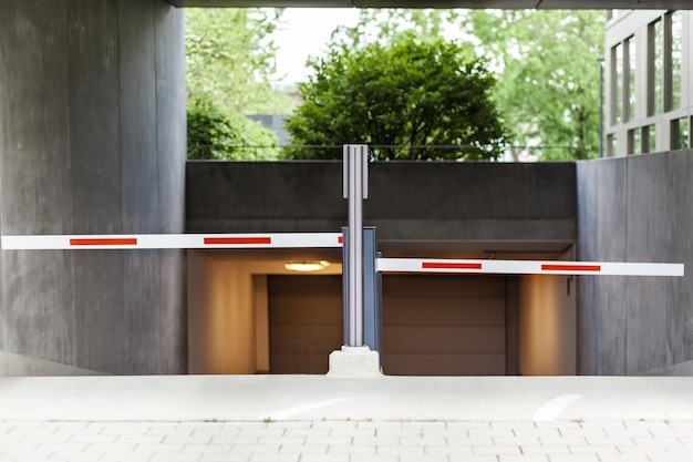 Entrance gate to underground garage parking Entrance barrier to Parking Auto parking entry exit