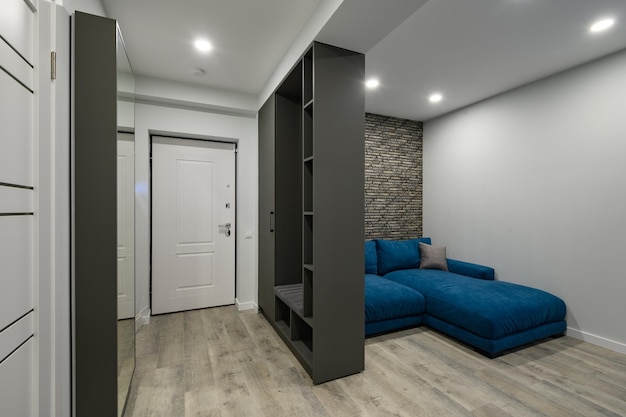 Entrance hall attached to small modern living room